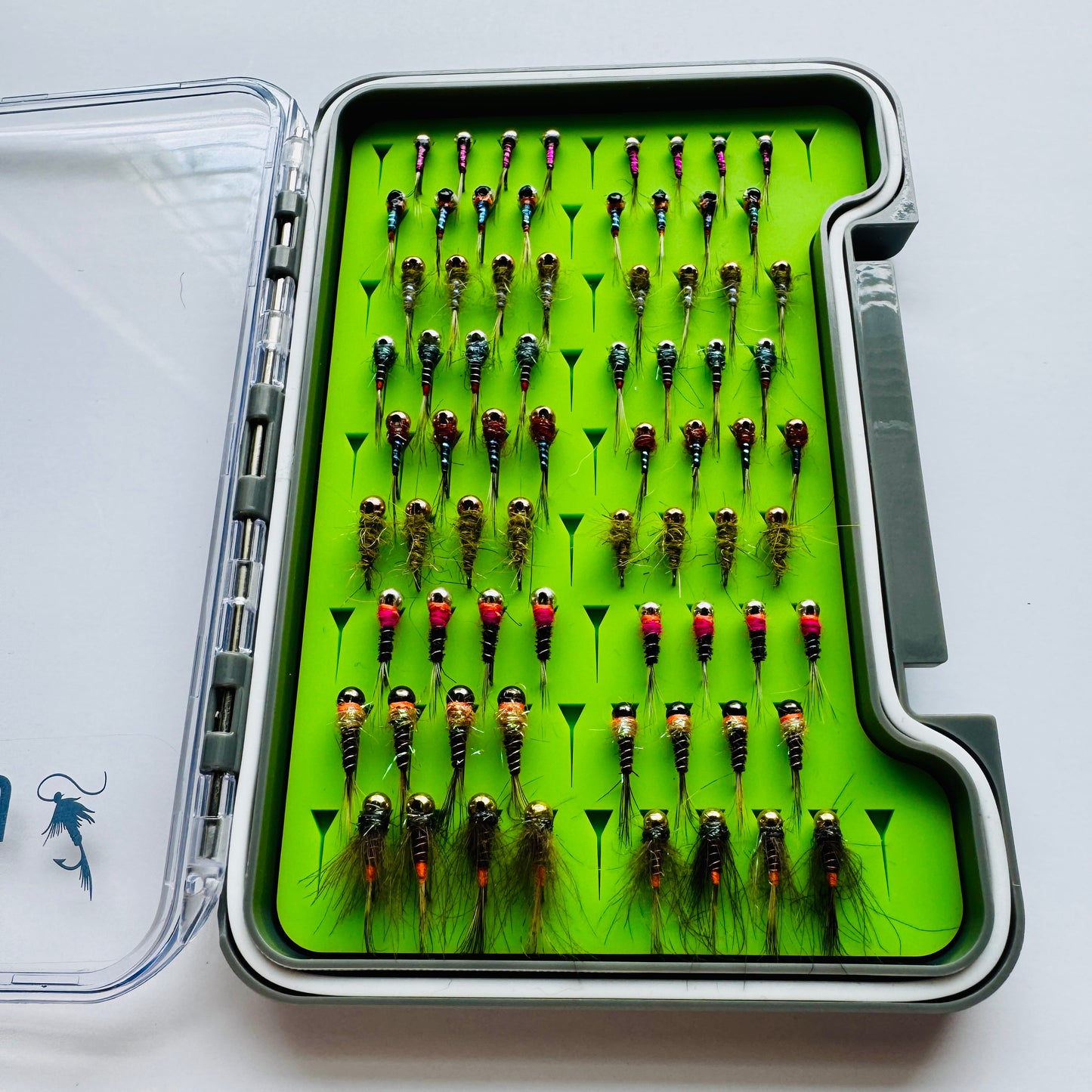 The Depth Charge Fly Box by Fly Life Outdoors showing an angled front shot of the open box.