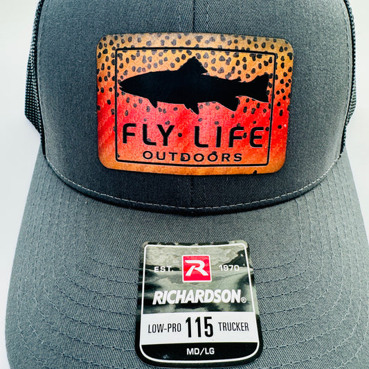 Close up view of The FLO 115 Trucker in Charcoal with Black Trout/Cutthroat patch | Charcoal/Black