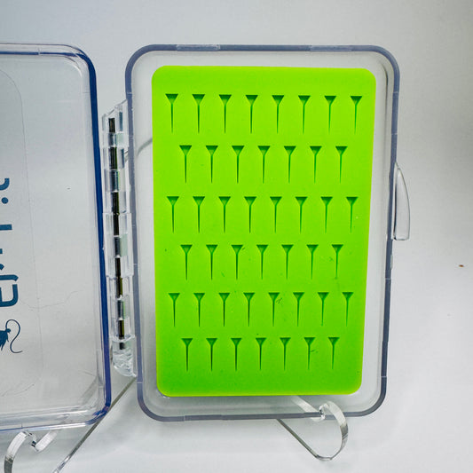 The Outpost Slim Fly Box (Small) by Fly Life Outdoors, open to show its compact 45-slot silicone insert.