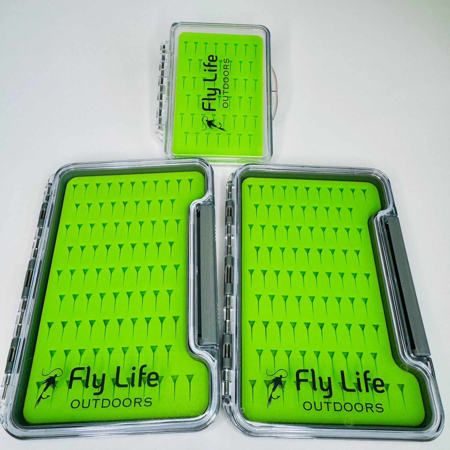 A group shot of the Fly Life Outdoors Guardian and Outpost empty fly boxes.