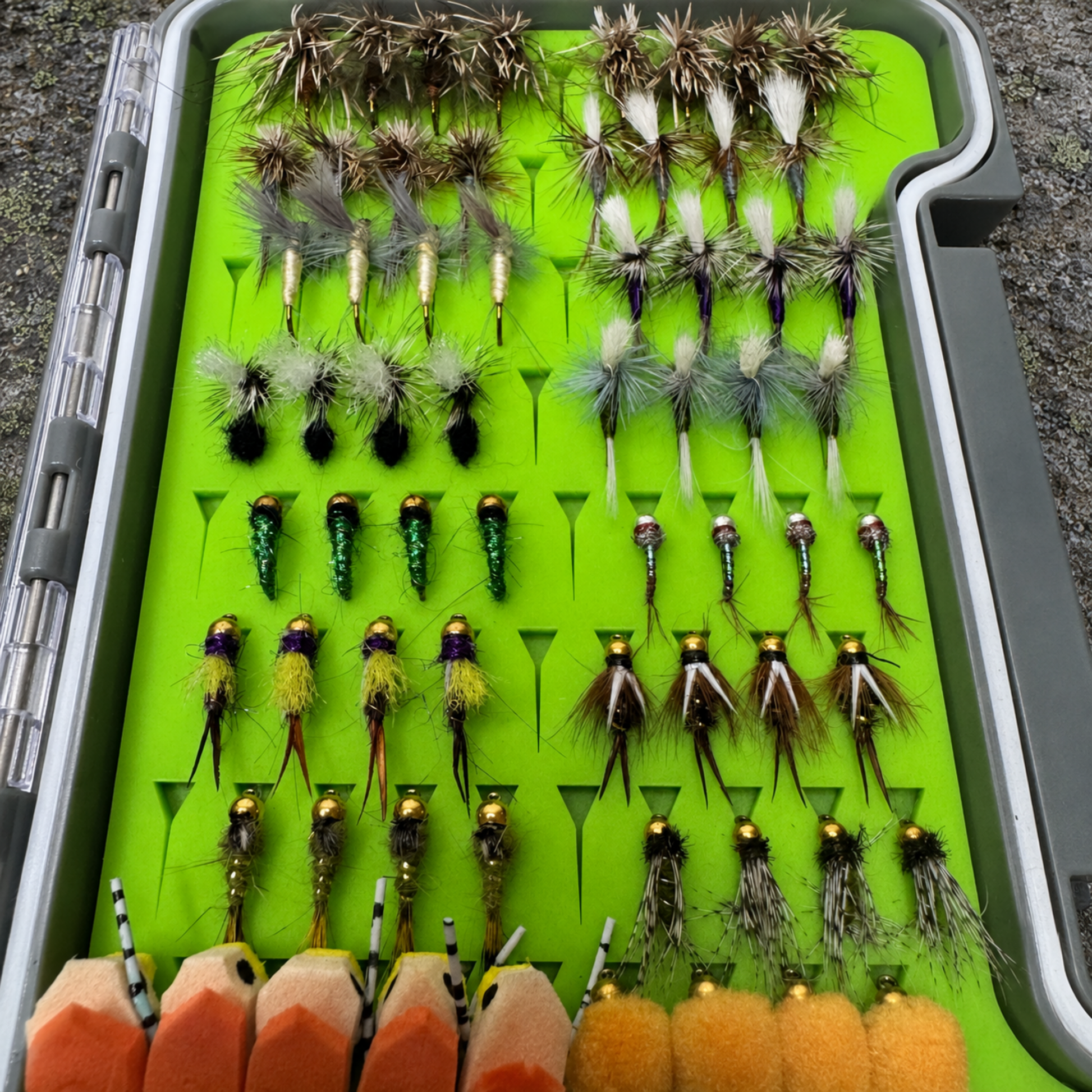 All-Water Arsenal fly box overhead view showing complete assortment of dry flies, tungsten nymphs, and Zebra Midges organized by section for North Carolina trout water