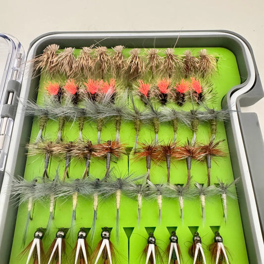 Angled view of caddis and parachute dry flies in the Essentials fly box