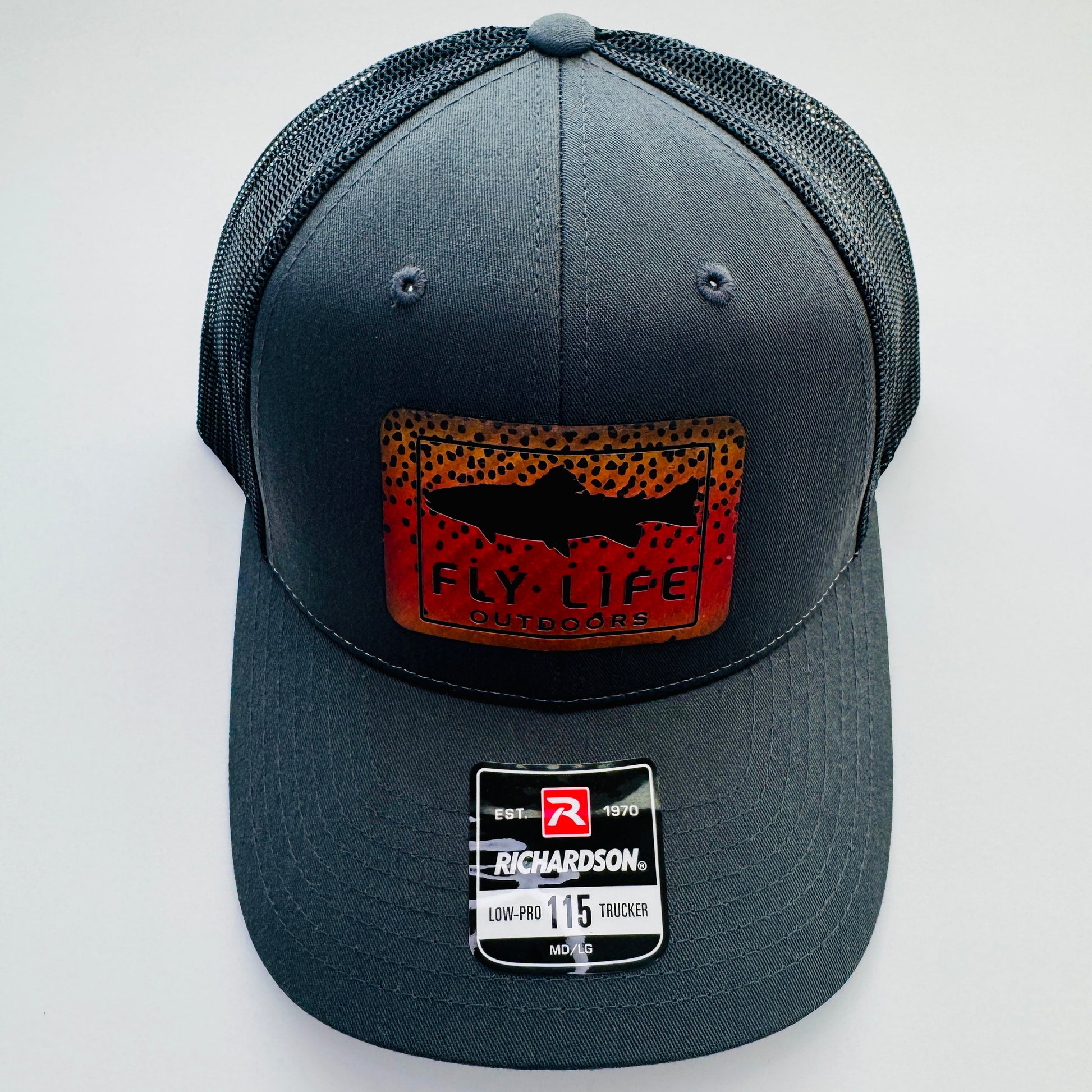 Top view of The FLO 115 Trucker in Charcoal with Black Trout/Cutthroat patch | Charcoal/Black