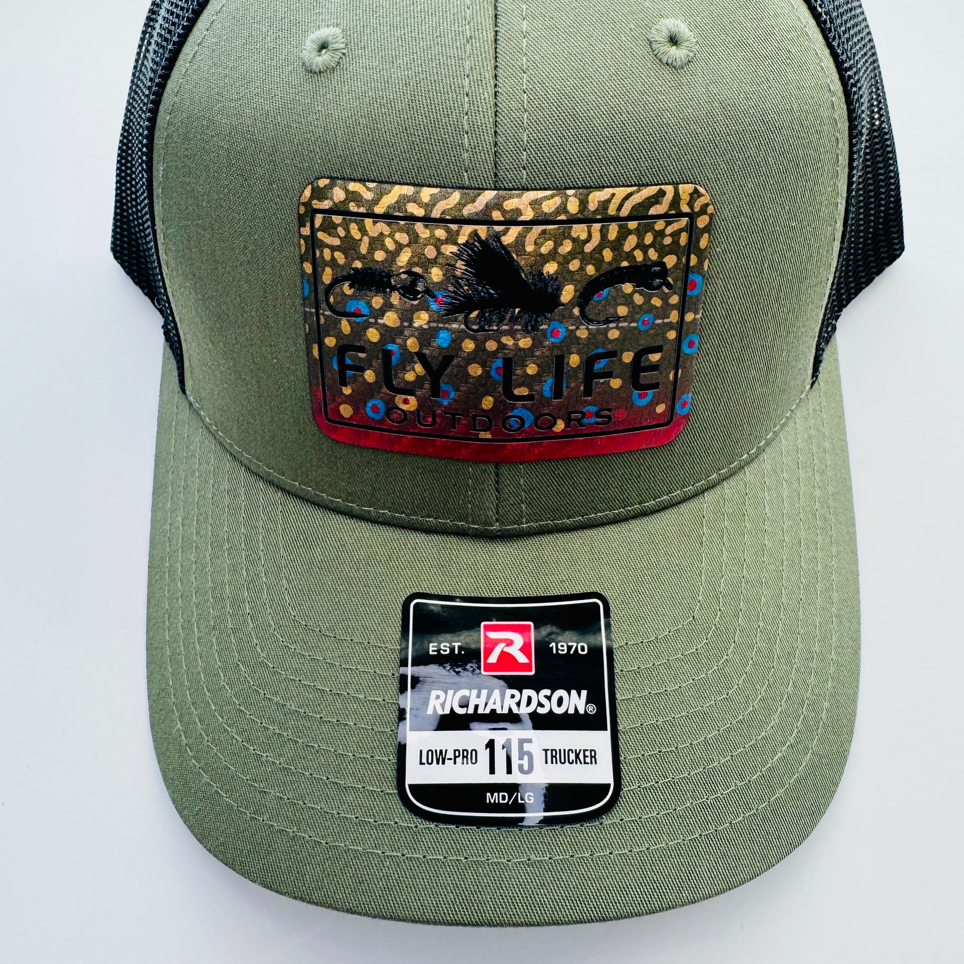 Top angle view of The FLO 115 Trucker in Olive with Black Tri-Fly/Brook Trout patch | Olive/Black