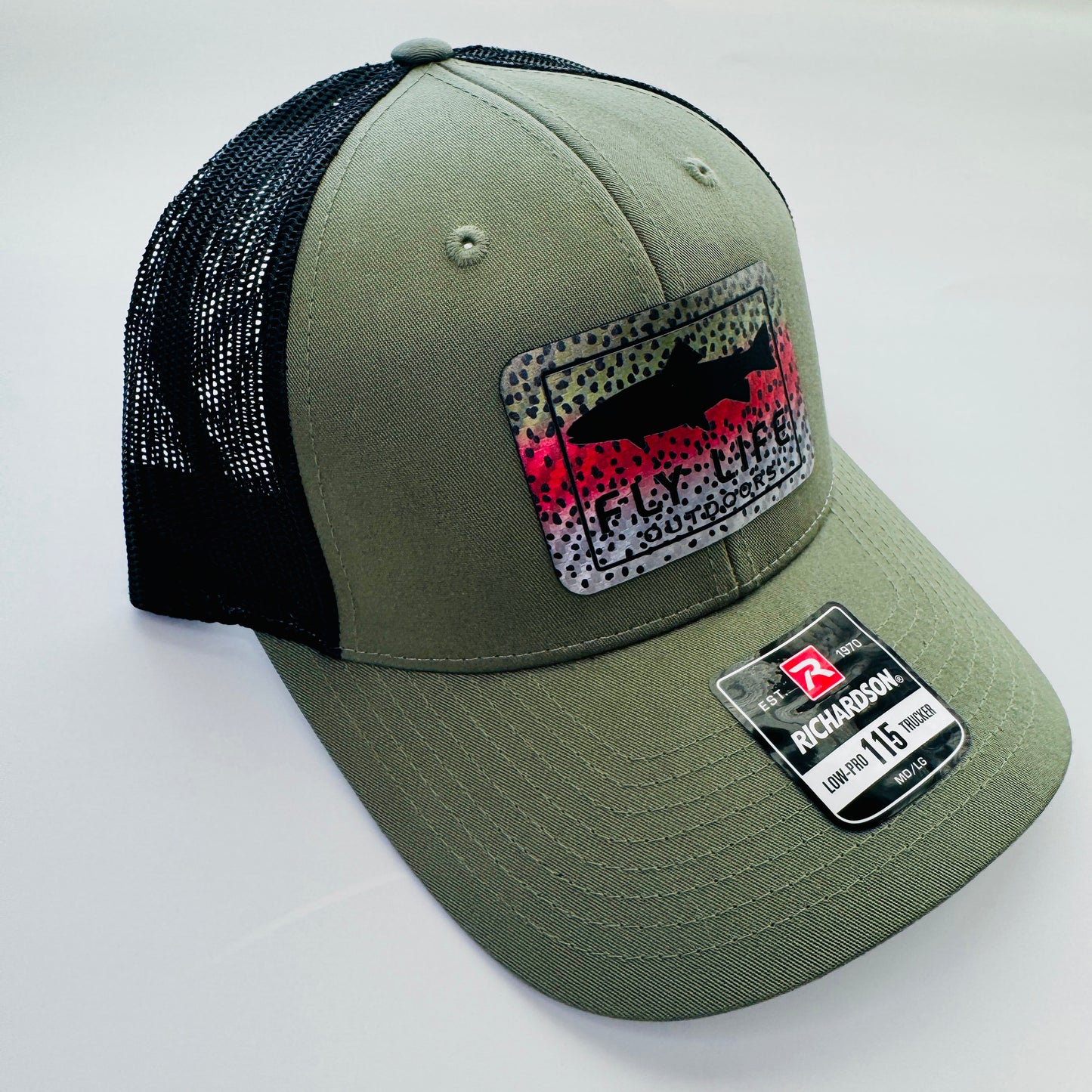 Left angle view of The FLO 115 Trucker in Olive with Black Trout/Rainbow Trout patch | Olive/Black