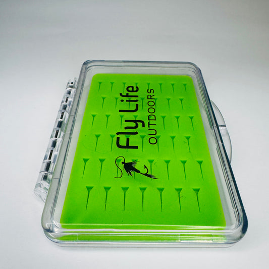 The compact Outpost Slim Fly Box (Small) closed, a perfect pocket box for the minimalist angler.
